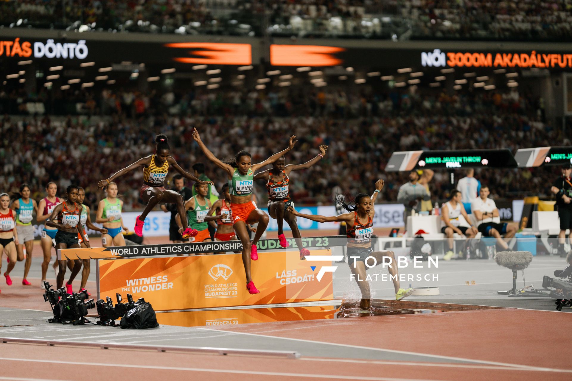 Leonard Chemutai (UGA/Uganda), Sembo Almayew (ETH/Ethiopia), Faith Cherotich (KEN/Kenya), Beatrice Chepkoech (KEN/Kenya) during the 3000 Metres Steeplechase on Day 9 of the World Athletics Championships Budapest 23 at the National Athletics Centre in Budapest, Hungary on August 27, 2023.